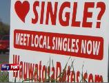dating service highway sign